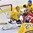 PLYMOUTH, MICHIGAN - April 1: Switzerland's Nicole Bullo #23 scores in Sweden's Sara Grahn #1 while her teammates Johanna Fallman #5 and Fanny Rask #20 look on to tie the game 1-1 during preliminary round action at the 2017 IIHF Ice Hockey Women's World Championship. (Photo by Minas Panagiotakis/HHOF-IIHF Images)